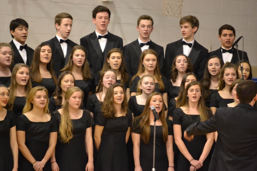 The Saint Viator choir performs during the Fine Arts assembly.