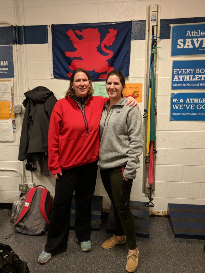 Polley and Garro pose for a picture in the athletic training room.