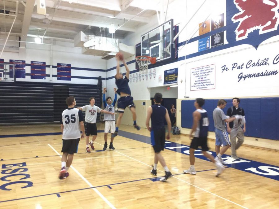 Saint Viator basketball players scrimmage against each other in practice