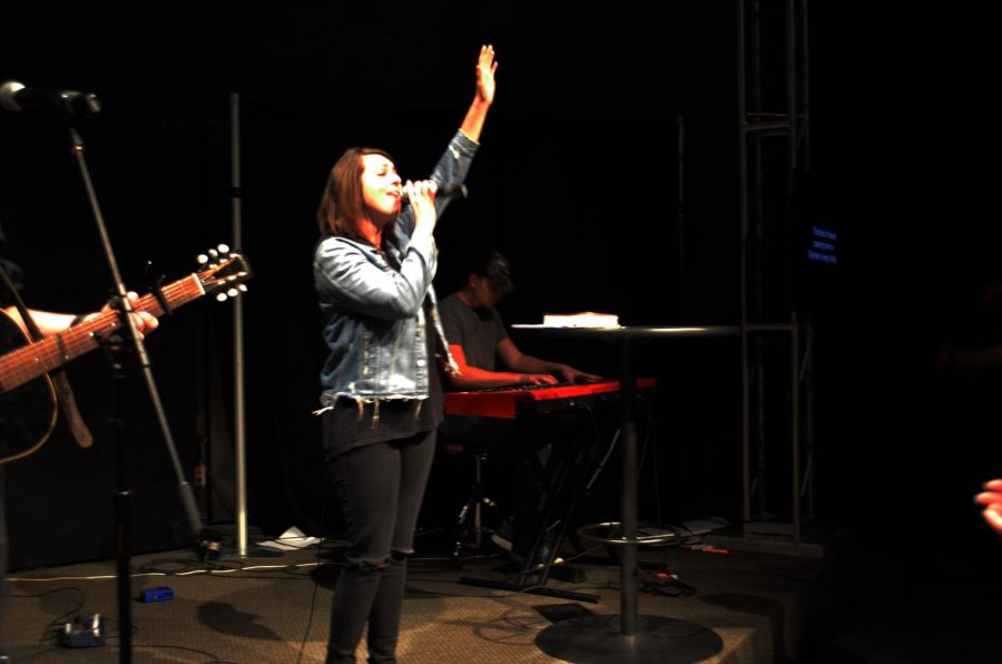 Lauren Smith leads worship at Harvest Students on March 18, 2018.