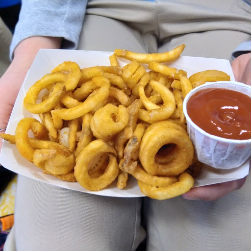 Senior Kate Capra enjoys curly fries, one of the most popular fries varieties.