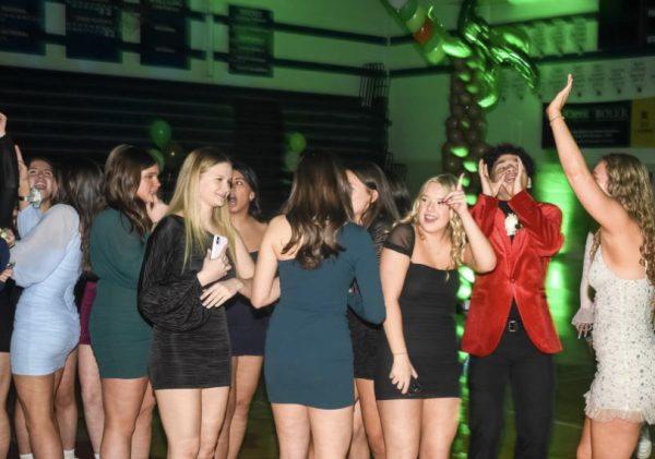 All students enjoy the Winter Ball, from showing off their dance moves, waving their hands in the air, and socializing all the more.	Photo courtesy of Saint Viator