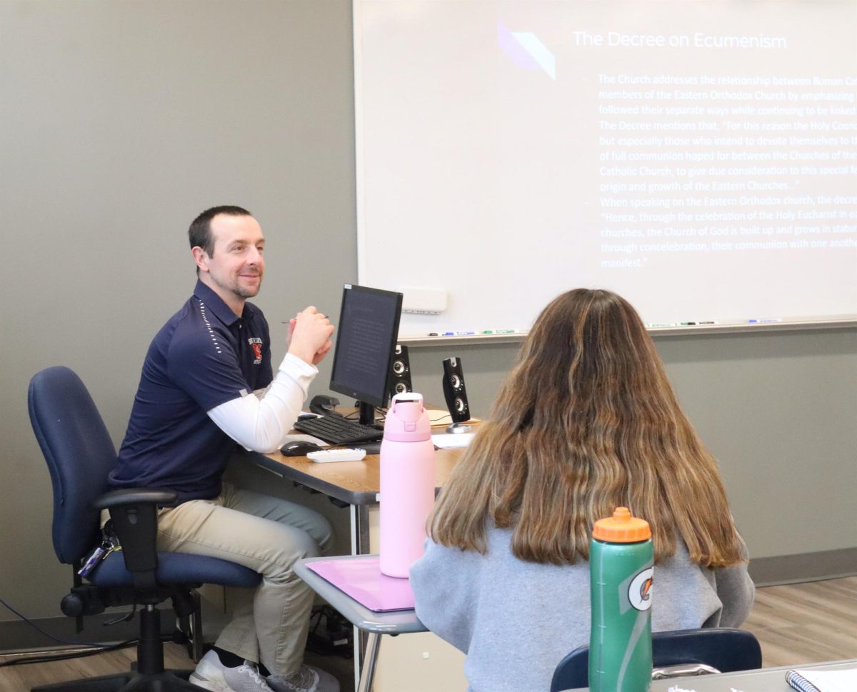 After 12 years, Mr. Archibald continues teaching religion classes.